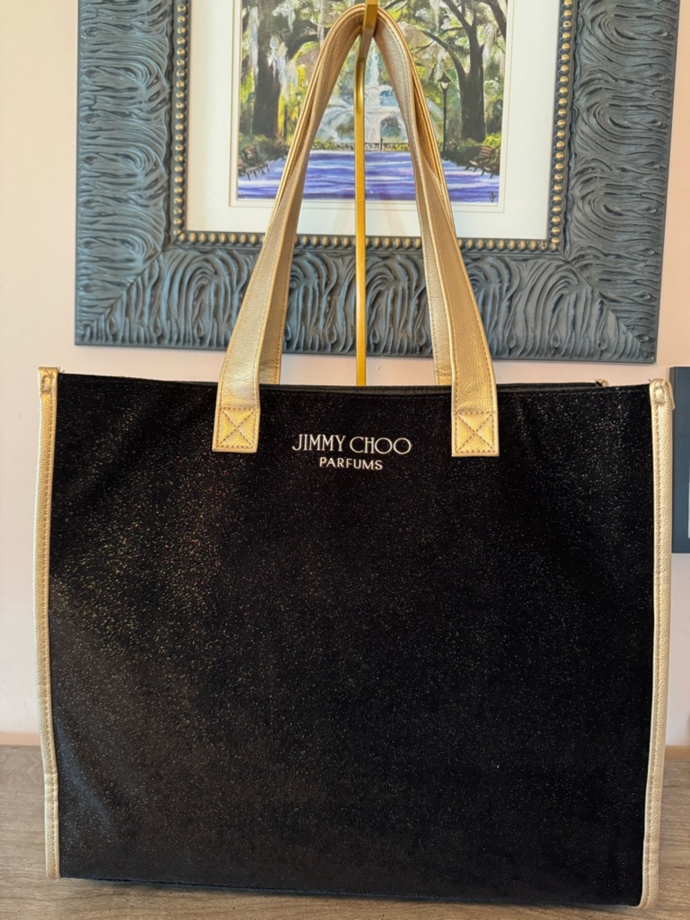Jimmy Choo Black And Gold Sparkle Tote. Gold handles and trim. No call outs